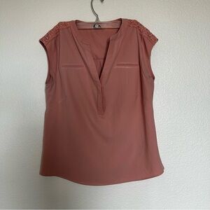 Eden Ruth Elegant Sleeveless Flowy Blouse in Dusty Pink with V-neck and Buttons
